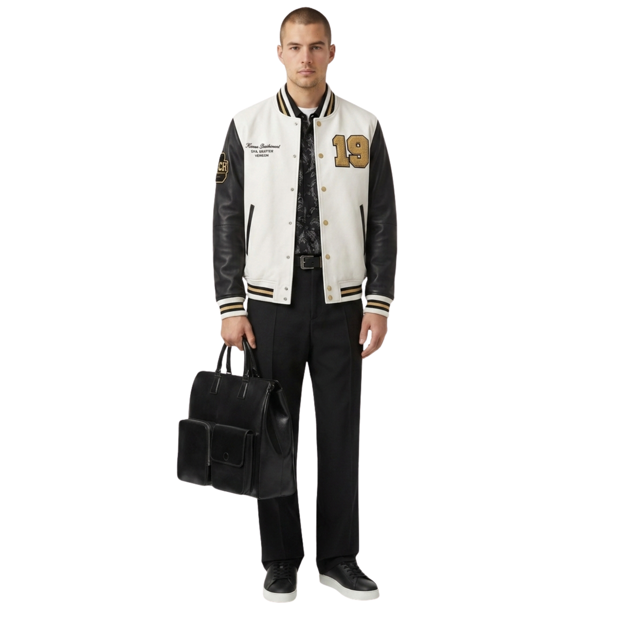 Man wearing a varsity jacket with letterman design, holding a black leather briefcase on a white background