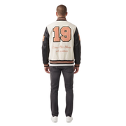 Men's varsity jacket with '19' and 'Same Old Shore' back print, leather sleeves, cream body, striped trim