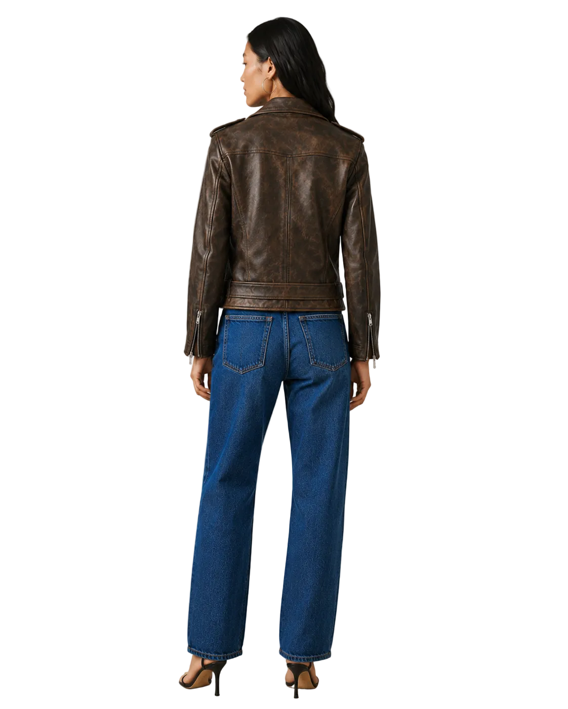 Woman wearing brown leather jacket and blue wide-leg jeans, back view
