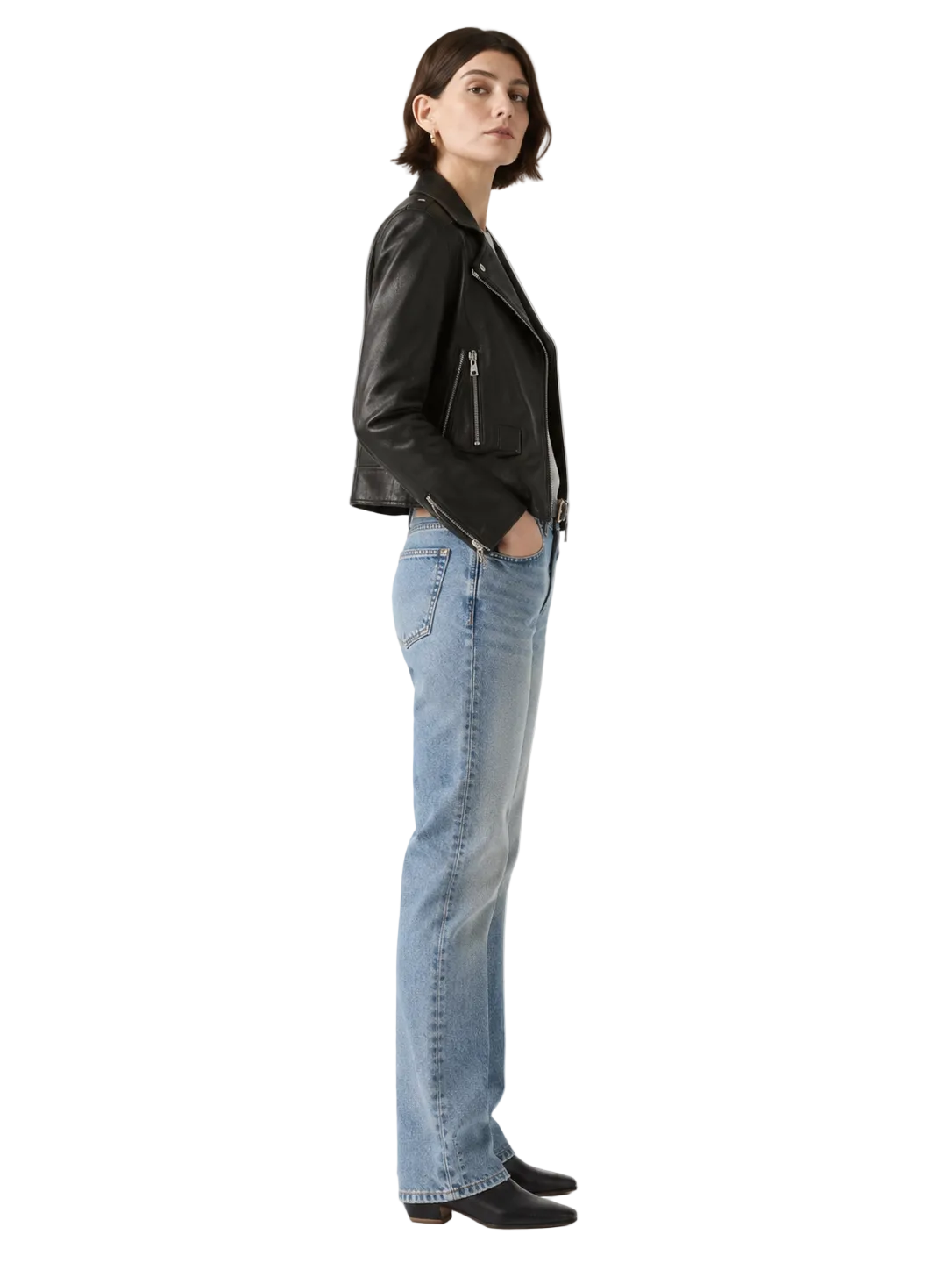 Woman in black leather jacket and light blue jeans, stylish casual outfit