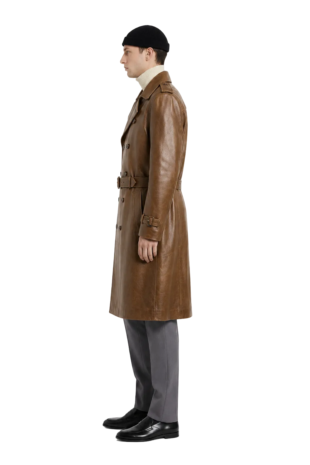 Men's brown leather trench coat with belt, styled with beanie and gray trousers
