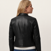 Black leather jacket with sleek stitching, worn by woman with blonde hair