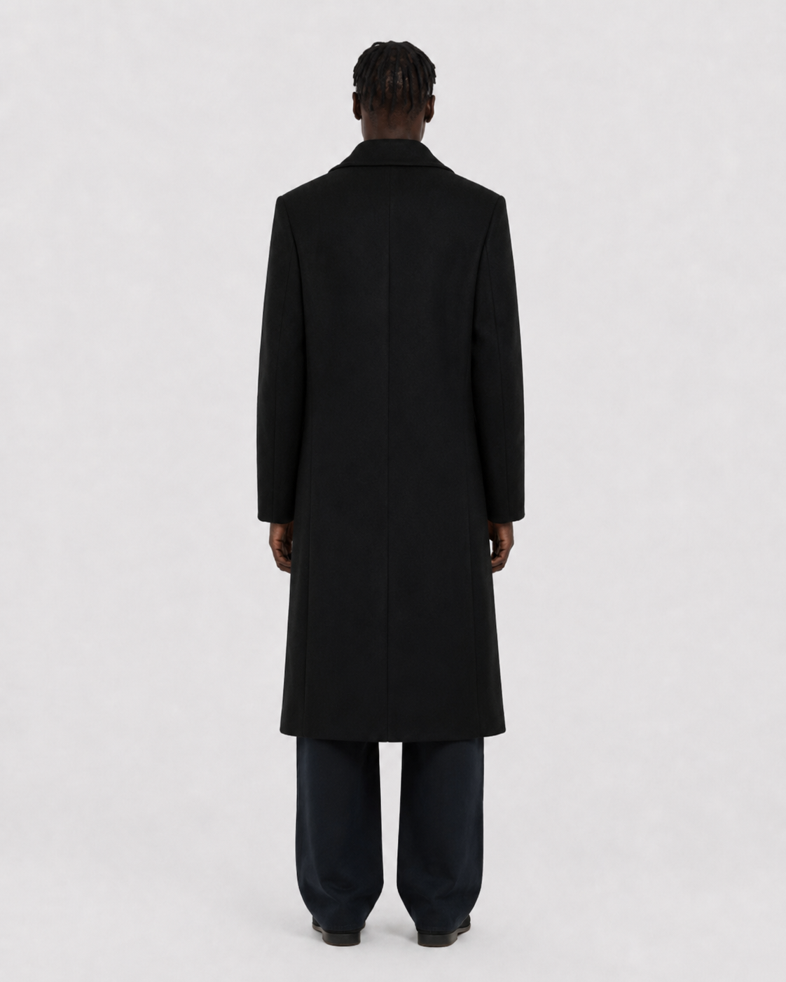 Black men's long coat back view, sleek minimalist design for winter wear