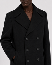 Black double-breasted wool coat with notched lapel and front pockets