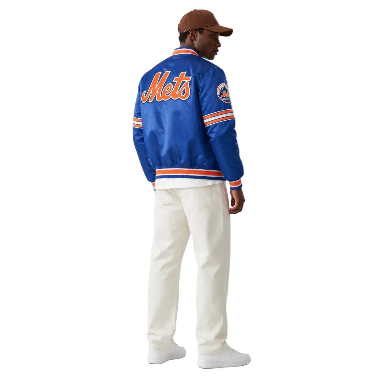 Blue Mets varsity jacket with orange lettering, striped cuffs, and team logo, worn with white pants and cap