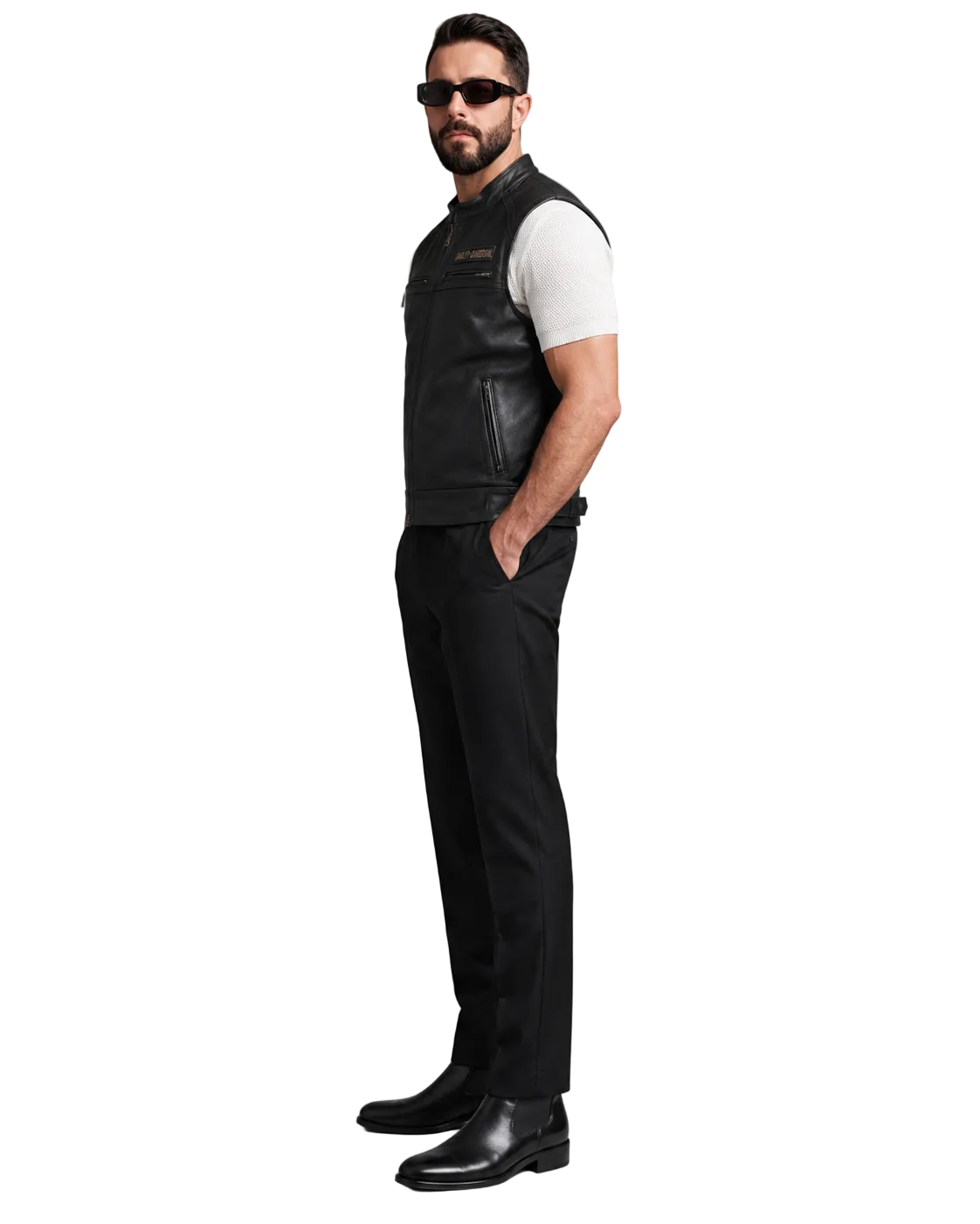 Man wearing black leather vest, sunglasses, and slim-fit pants for a stylish biker look