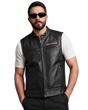 Man wearing black Harley-Davidson leather vest with front zipper and pockets, styled with white mesh tee and sunglasses