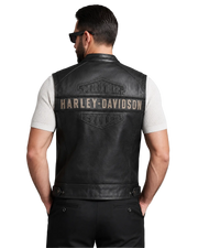 Men's black leather Harley-Davidson vest with embossed logo, worn over white mesh shirt