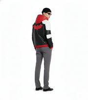 Men's black leather jacket with red bat logo, white panels, and hood, styled with gray pants and beanie