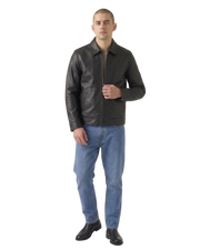 Men's black leather jacket with zipper front, paired with blue jeans and black boots for casual style.
