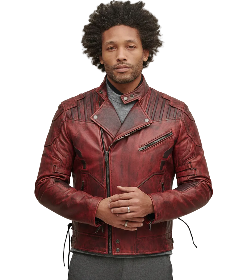 Men's red distressed leather biker jacket with zippers and straps, styled over gray sweater