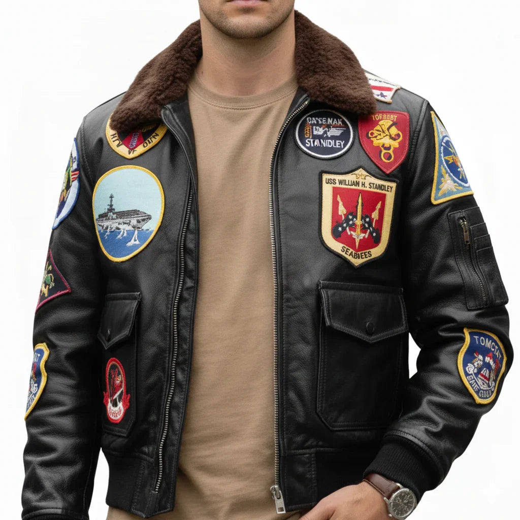 Black leather bomber jacket with military patches, shearling collar, and front pockets