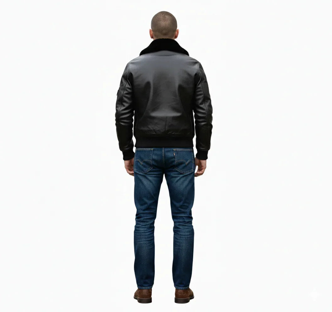 Men's black leather bomber jacket with shearling collar, back view, paired with blue jeans