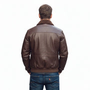 Brown leather bomber jacket with shearling collar, back view on male model
