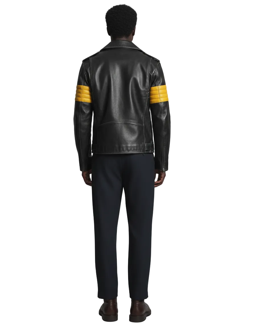 Person wearing a black leather jacket with yellow stripes on sleeves against a gray background