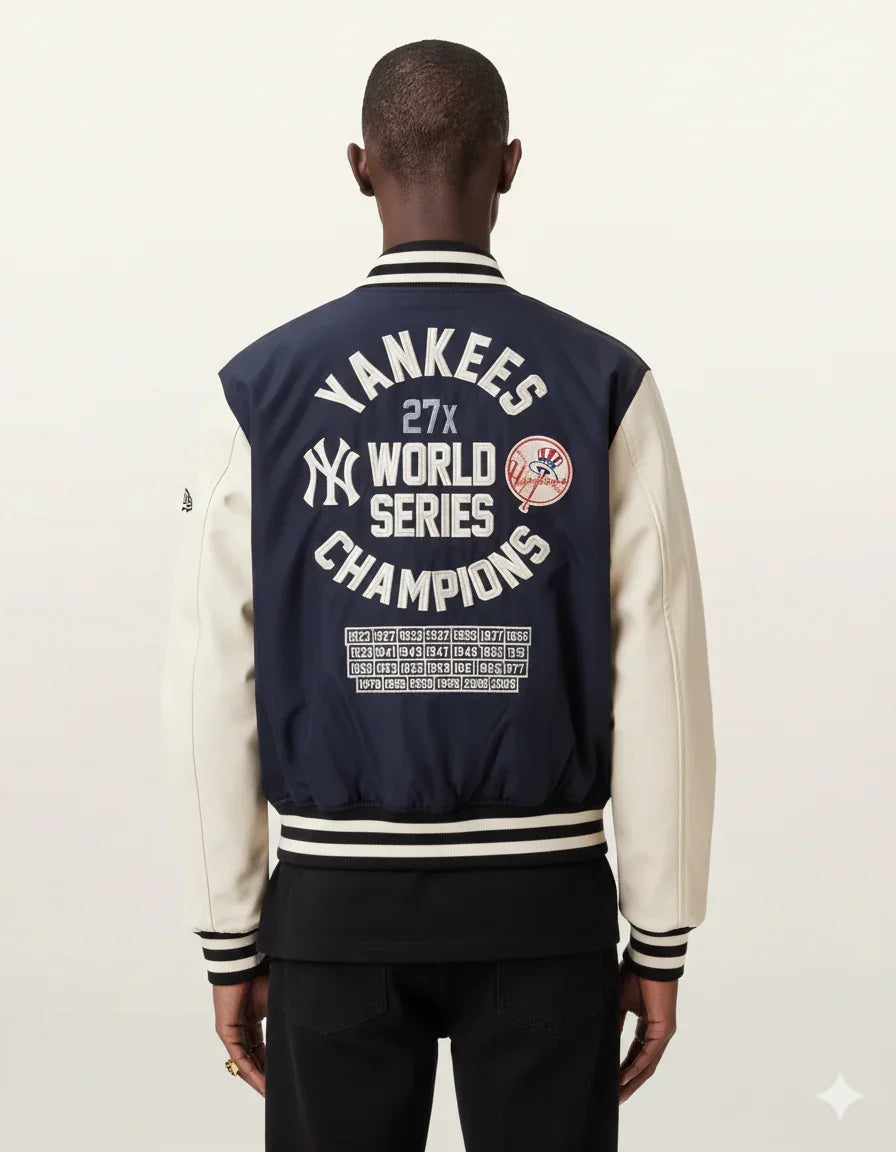 Yankees 27x World Series Champions varsity jacket with cream sleeves and navy back