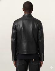 Black leather moto jacket with back seam detail, worn by man with dark jeans