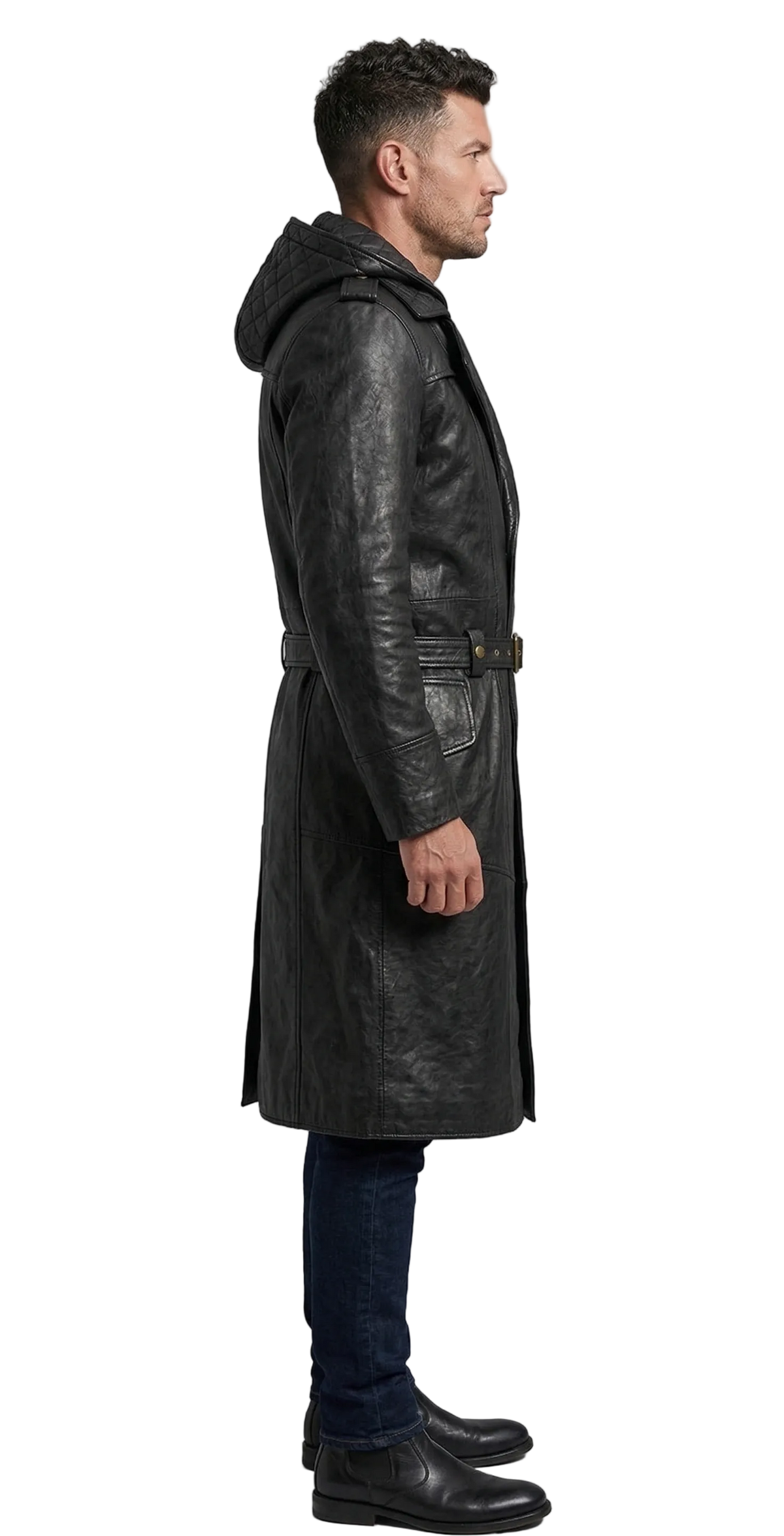Man wearing a long black leather coat on a gray background