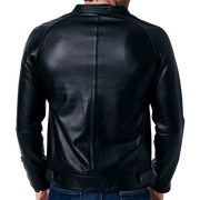 Black leather jacket back view, sleek design with zipper collar and side pockets, worn with jeans