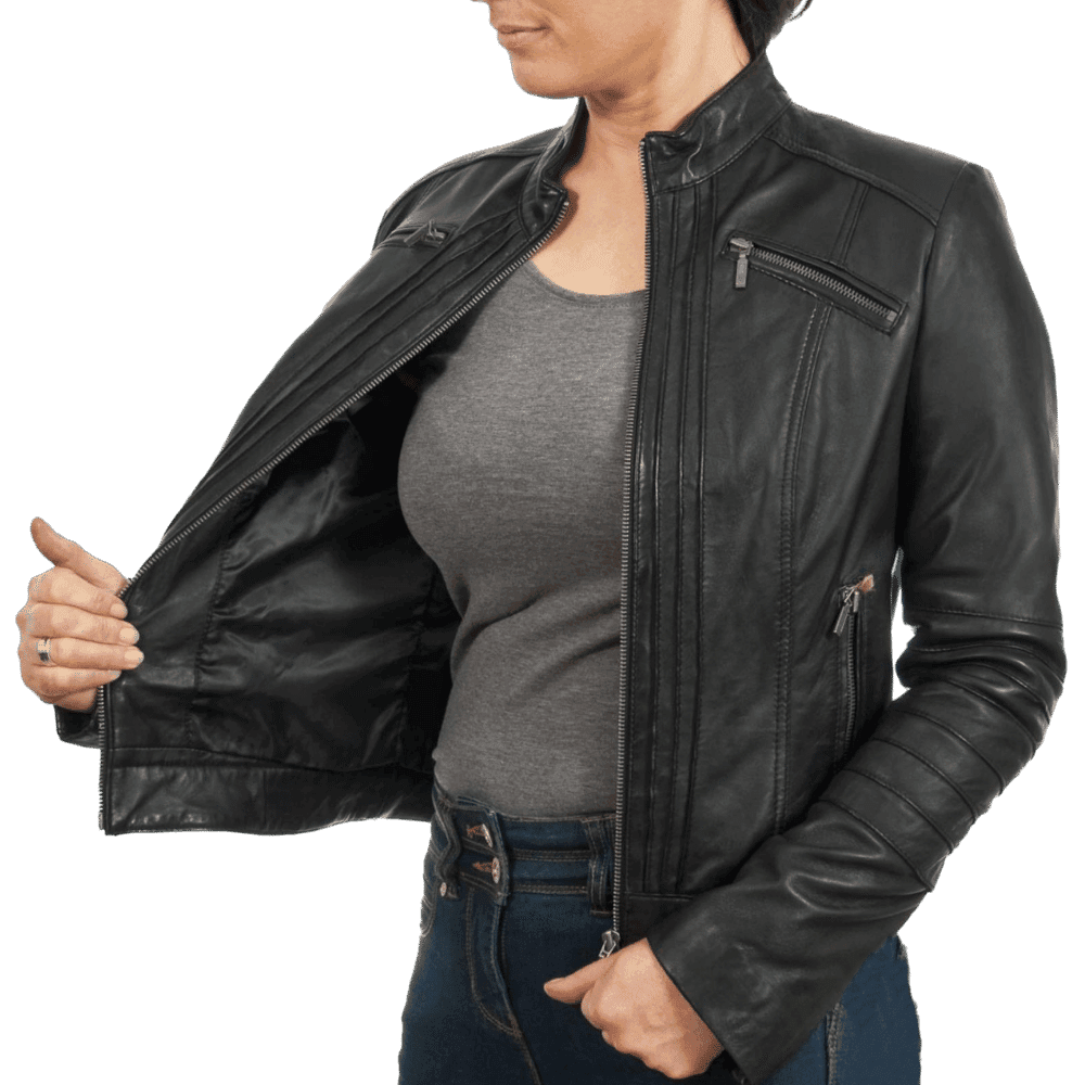 Woman modeling black leather moto jacket with zippers and ribbed sleeves over gray top